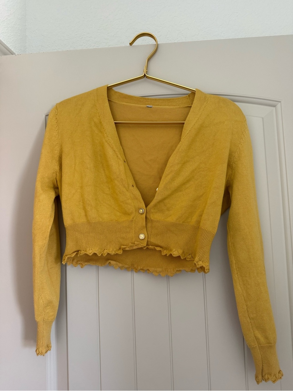 Yellow Cropped Ruffle Hem Cardigan - some distress on the back at the collar